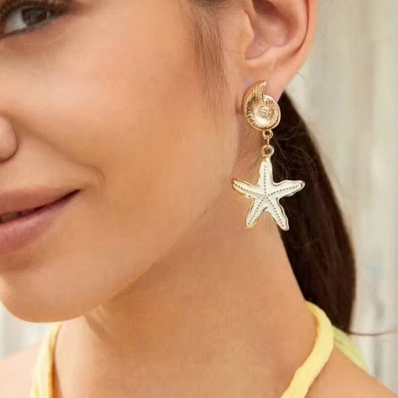 Anthropologie Jewelry - Anthropologie Gold and Cream Starfish Earrings